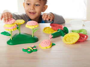 Boy playing with Flower Maker Dough Set