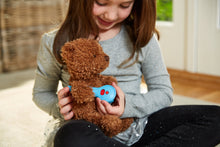 Load image into Gallery viewer, Girl playing with thermometer from Doctor's Kit