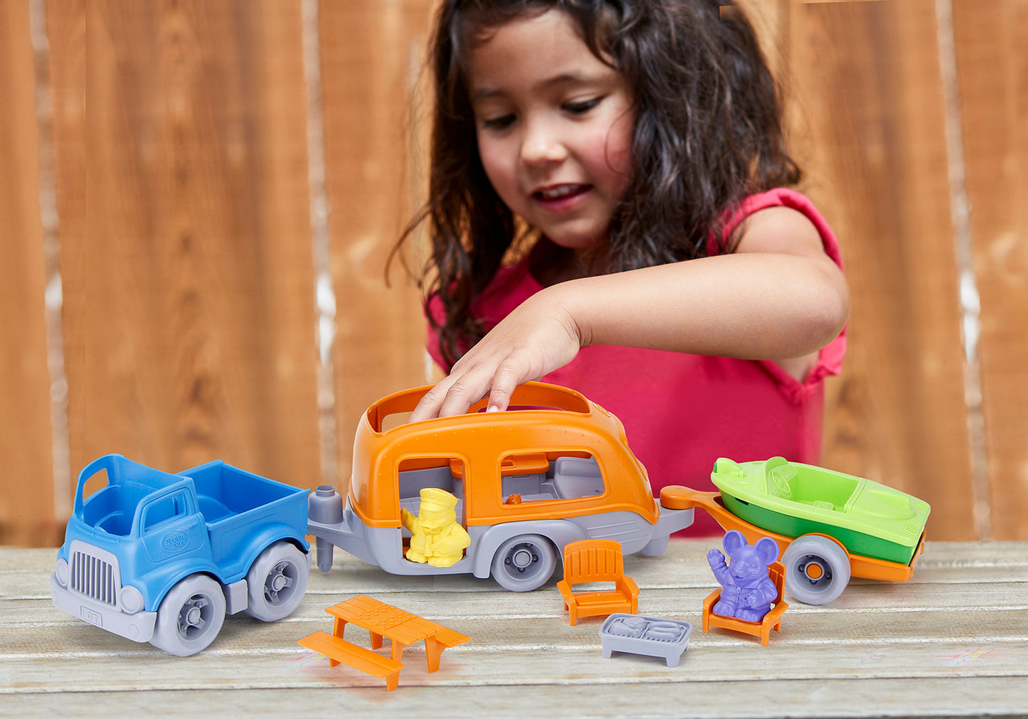 Girl playing with RV Camper Set