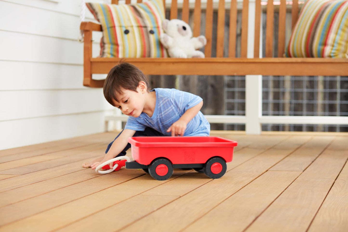 Boy playing with Elmo's Wagon