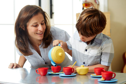 Adult and boy with Blue Tea Set