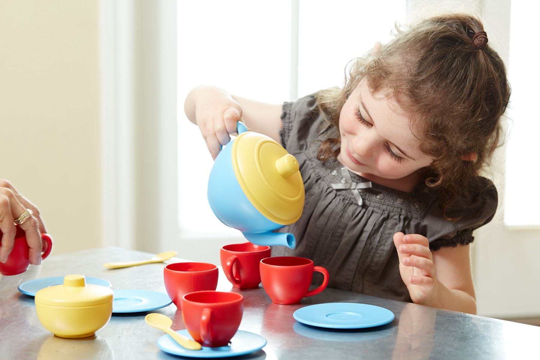 Girl with Blue Tea Set