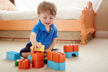 Boy playing with Block Set