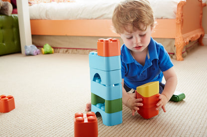 Boy playing with Block Set