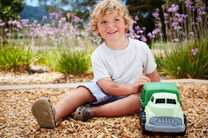 Boy playing with Recycling Truck