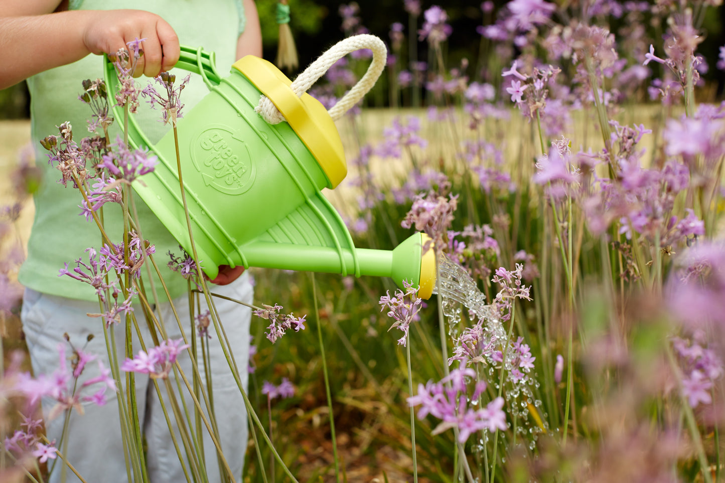 Watering Can watering flowers