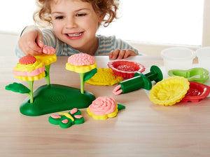 Girl playing with Flower Maker Dough Set