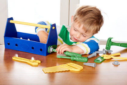 Boy playing with Blue Tool Set
