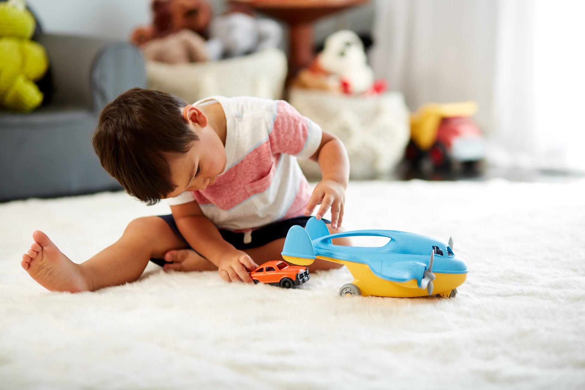 Boy playing with Cargo Plane