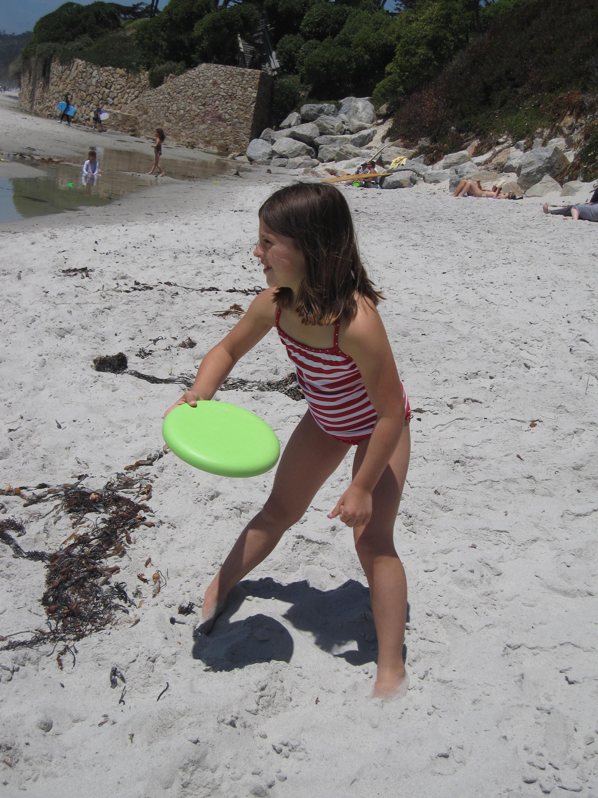 Girl getting ready to throw EcoSaucer