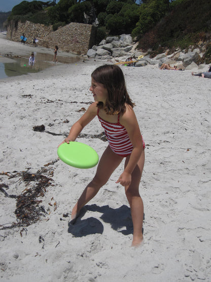 Girl getting ready to throw EcoSaucer