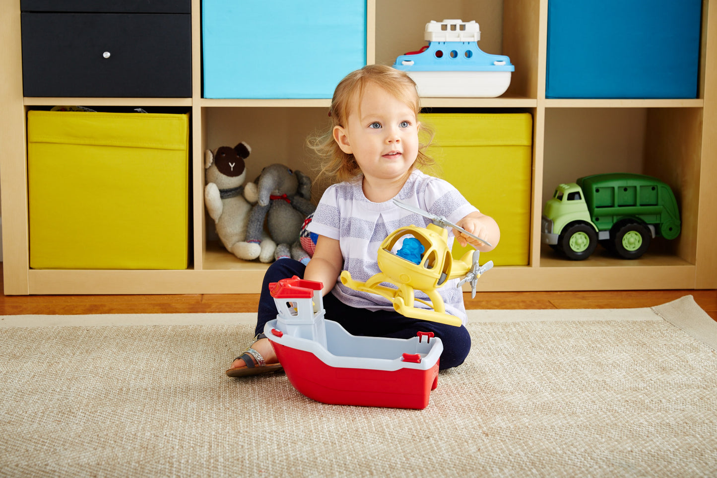 Girl playing with Rescue Boat & Helicopter