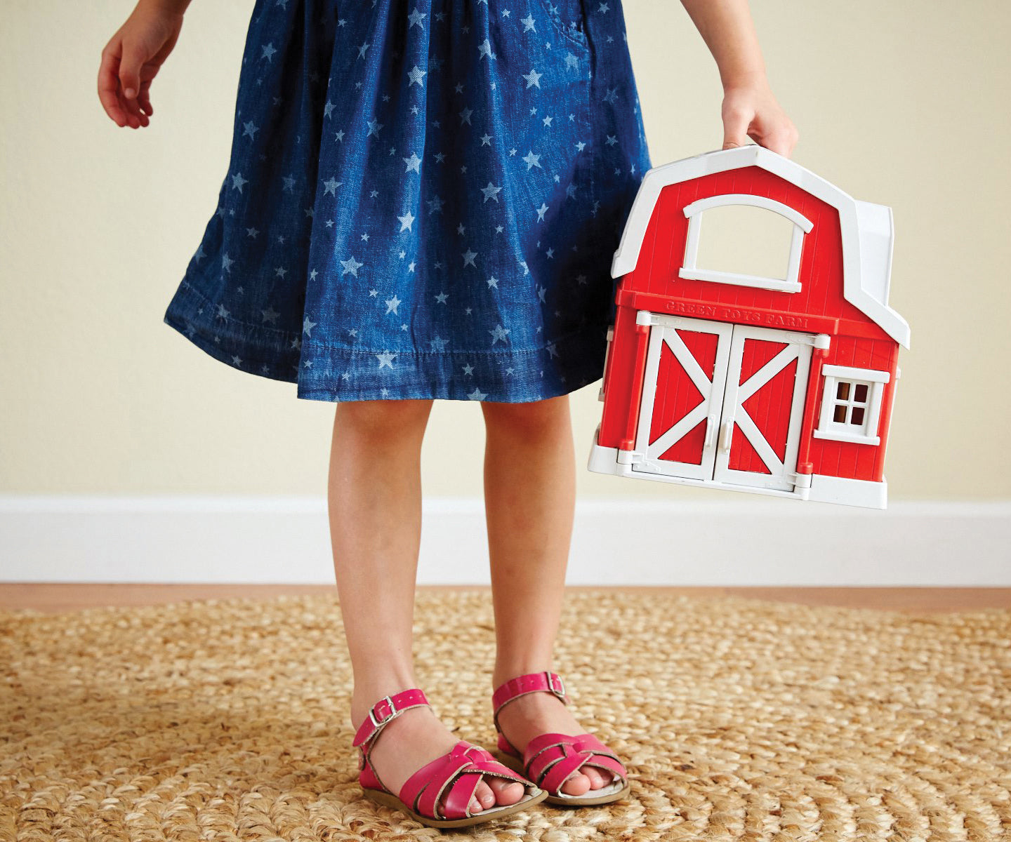 Girl holding Farm Playset