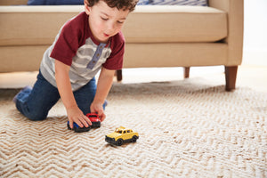 Boy playing with Mini Vehicle Set