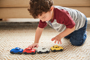 Boy playing with Mini Vehicle Set