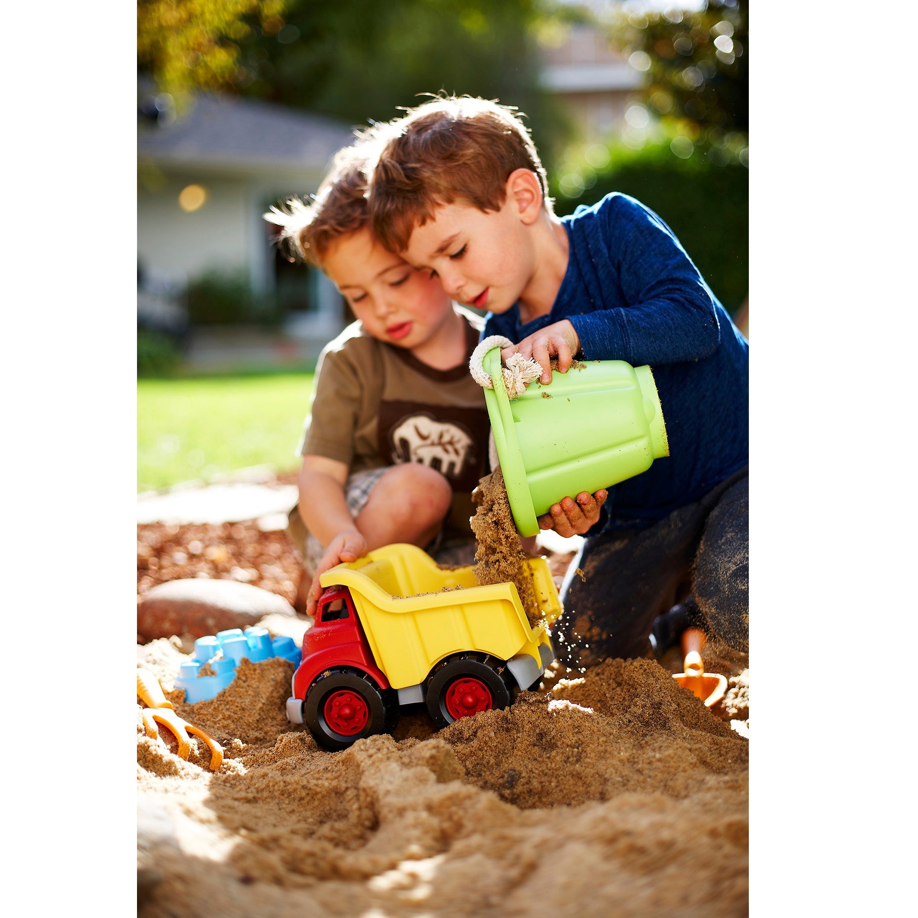 Two boy playing with Sand Play Set and Dump Truck