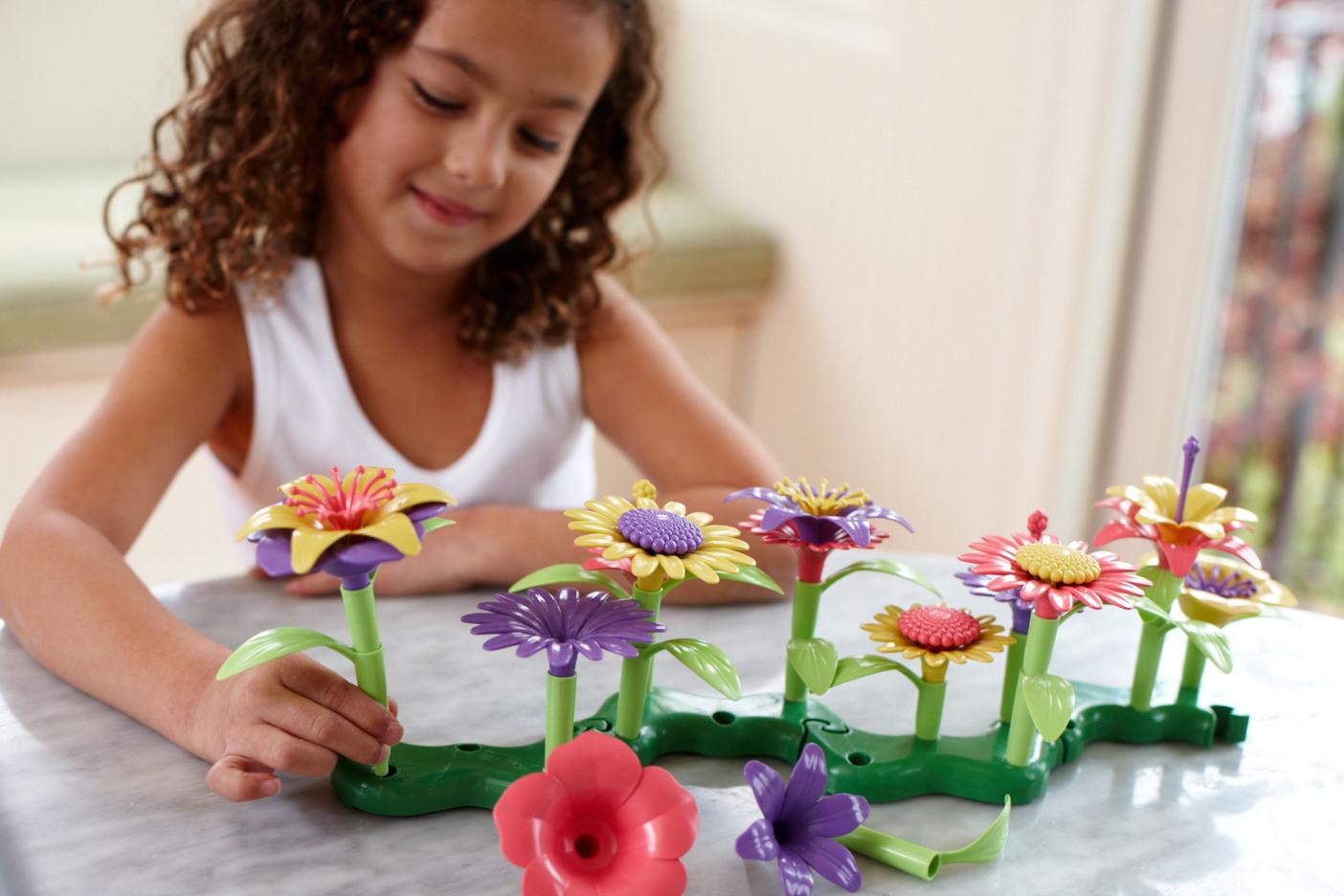 Girl playing with Build-a-Bouquet