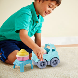 Boy playing with Cupcake Truck