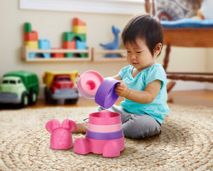 Child playing with Minnie Mouse Stacker
