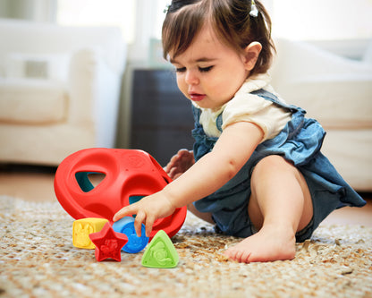 Child playing with Mickey Mouse & Friends Shape Sorter