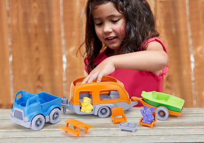 Girl playing with RV Camper Set