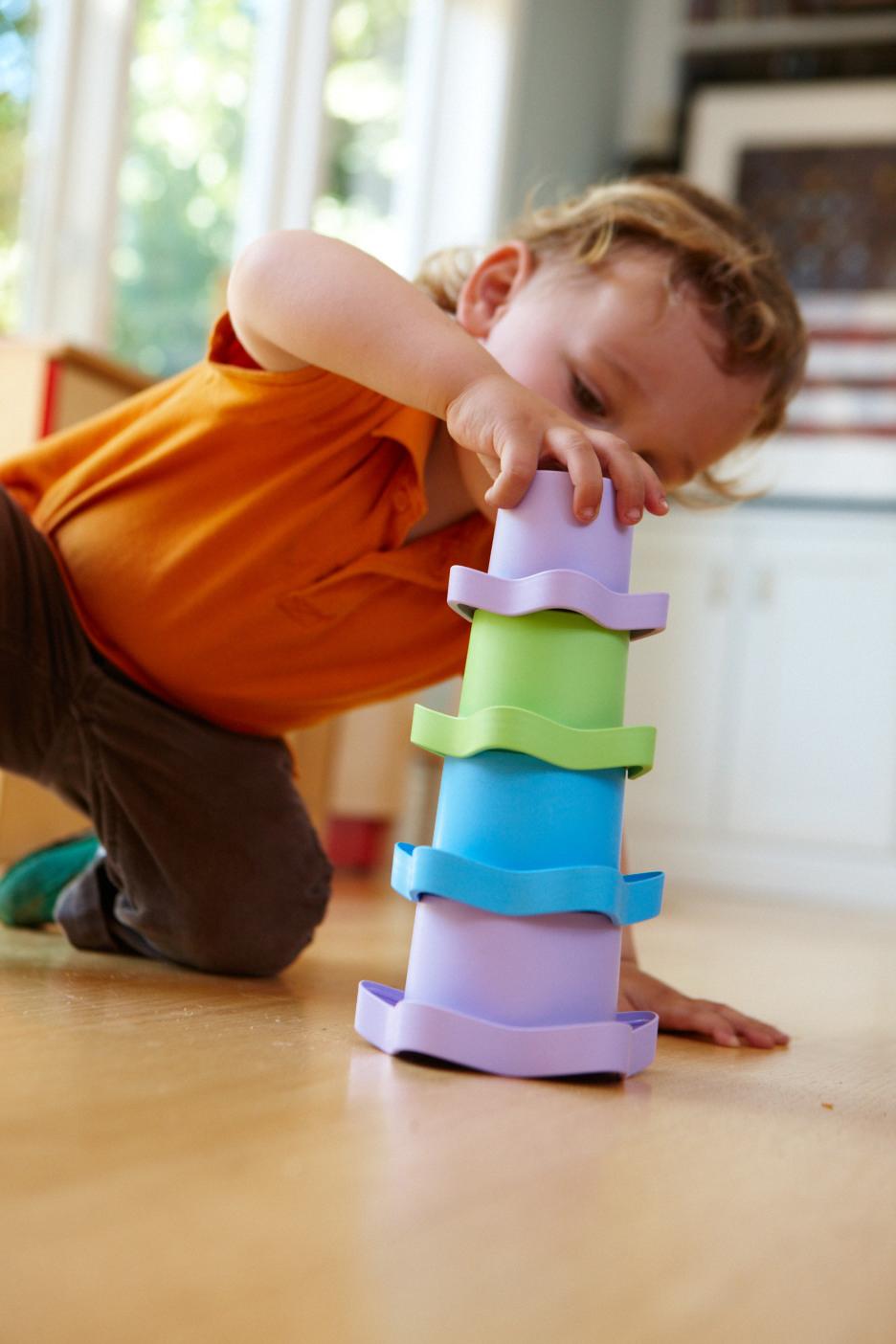Child stacking the Stacking Cups
