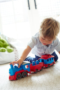 Boy playing with Train