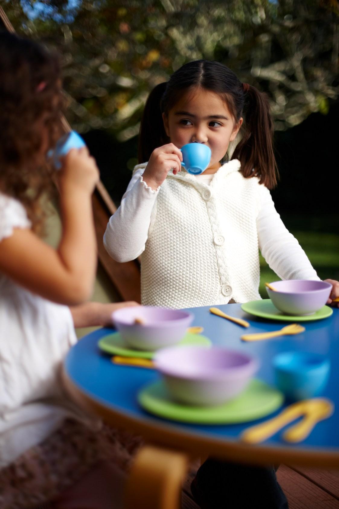 Girls playing with Dish Set