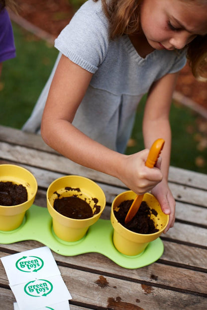 Girl planting with Indoor Gardening Kit