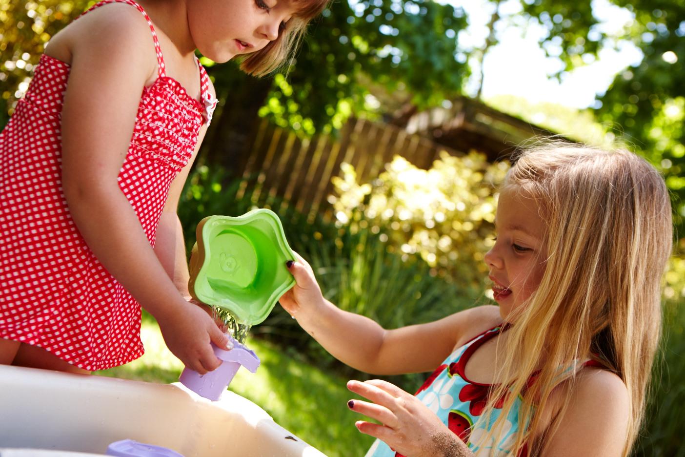 Two girls playing with Stacking Cups