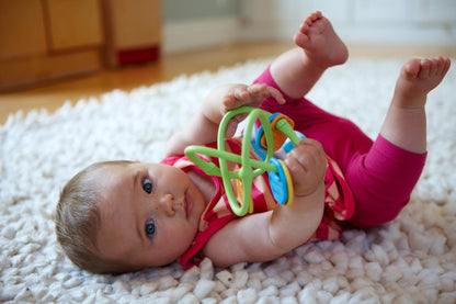 Baby holding Twist Teether
