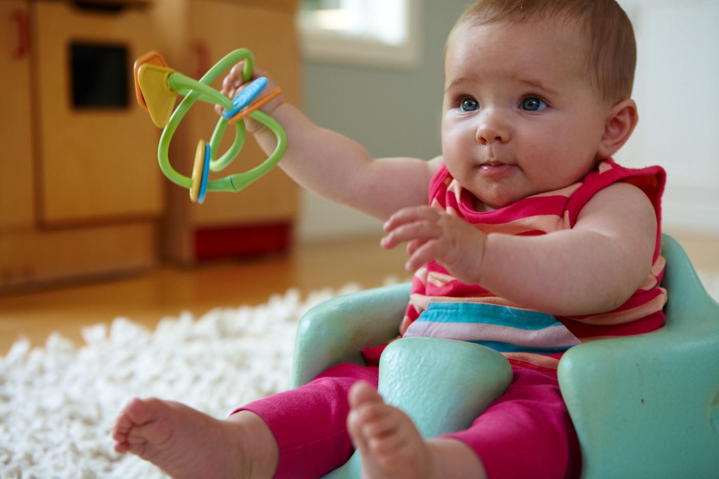 Baby holding Twist Teether
